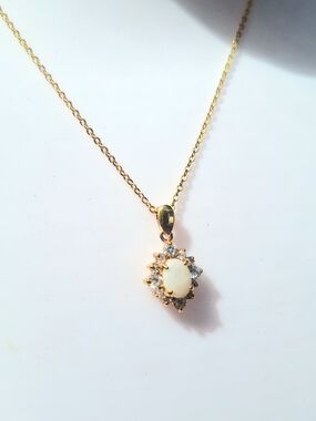 Gold-tone Opal Halo Pendant Necklace and matching Earrings